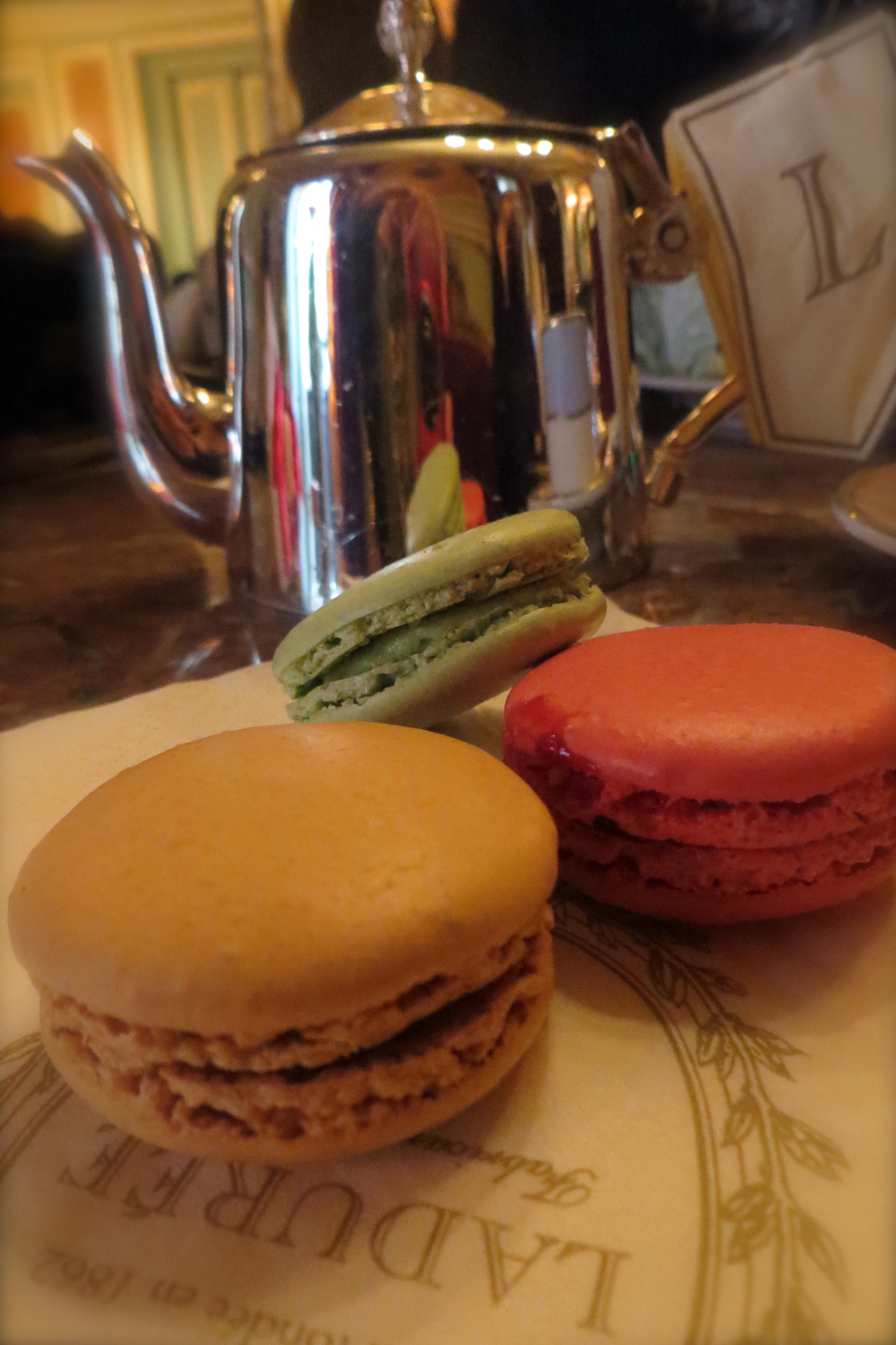 Trying the famous Ladurée macaroons and coffee in Paris